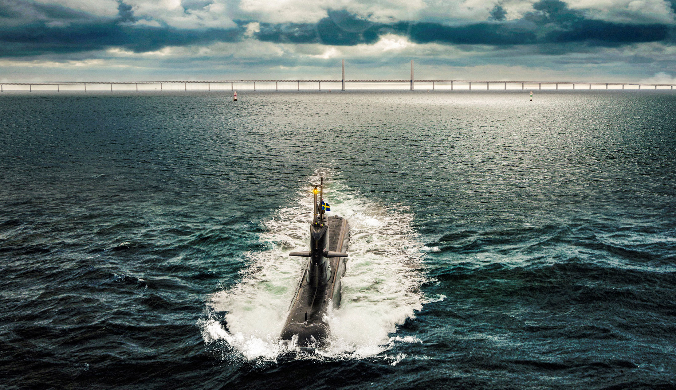 A submarine in the sea beneath the Øresund Bridge between Denmark and Sweden.